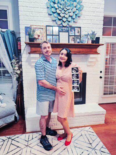 Brandon and Cindy holding their ultrasound photos | TRM | Chattanooga, TN