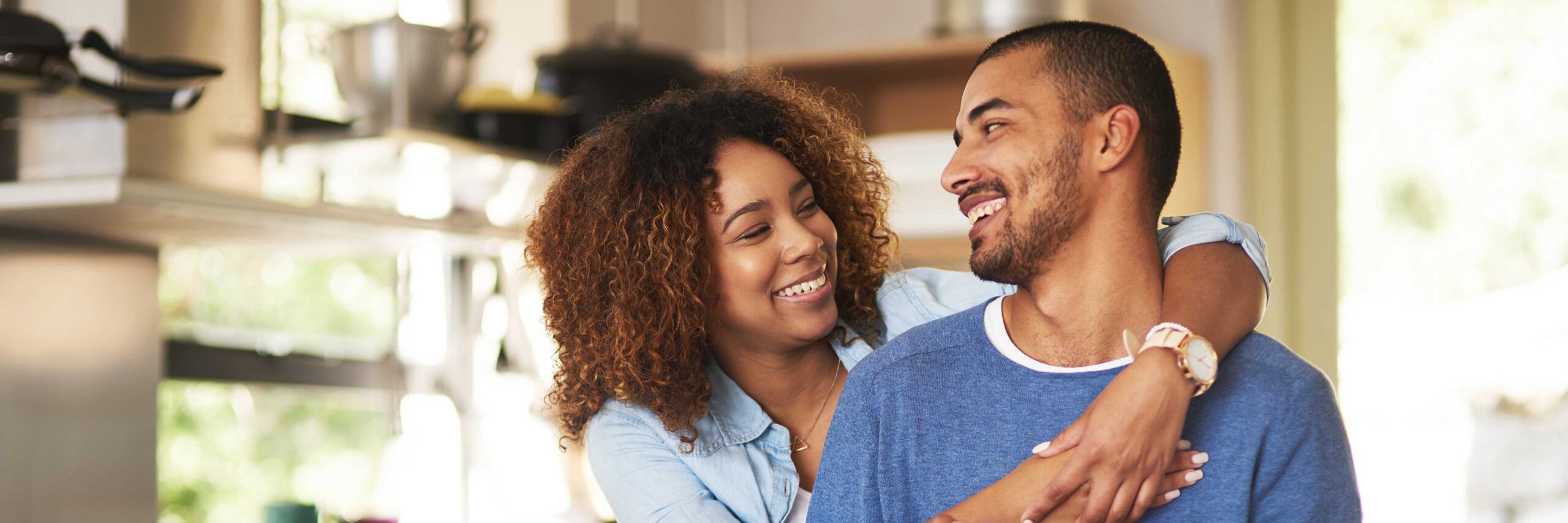 Couple smiling while discussing a natural cycle IVF at Tennessee Reproductive Medicine in Chattanooga