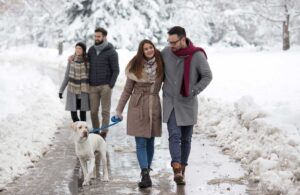 Couple walking in the snow discusses frozen embryo storage | Tennessee Reproductive Medicine | Chattanooga